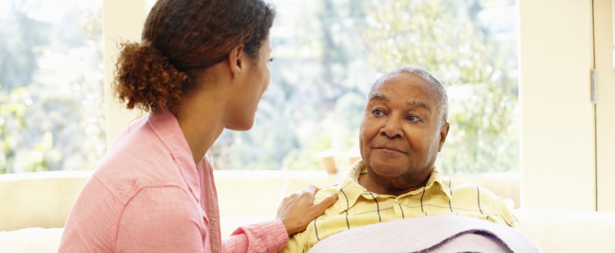 Aide_Sick_Man_Home_Af-Am_iStock_000018312669Large_Panoramic