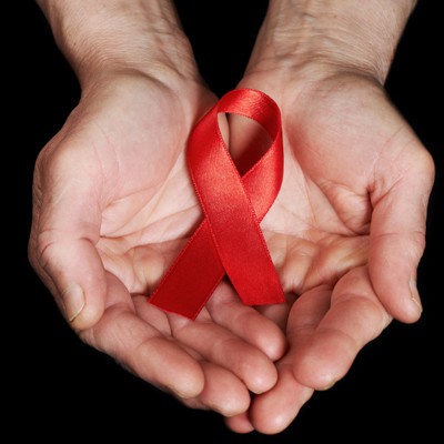 The red ribbon is a familiar symbol of HIV/AIDS.