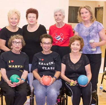 Members of exercise instructor Marvin Dismuke's class pose for a photo. (Photo courtesy of KleinLife)