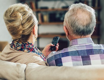 CROPPEDTWOCouple-Watching-TV_iStock-910825010