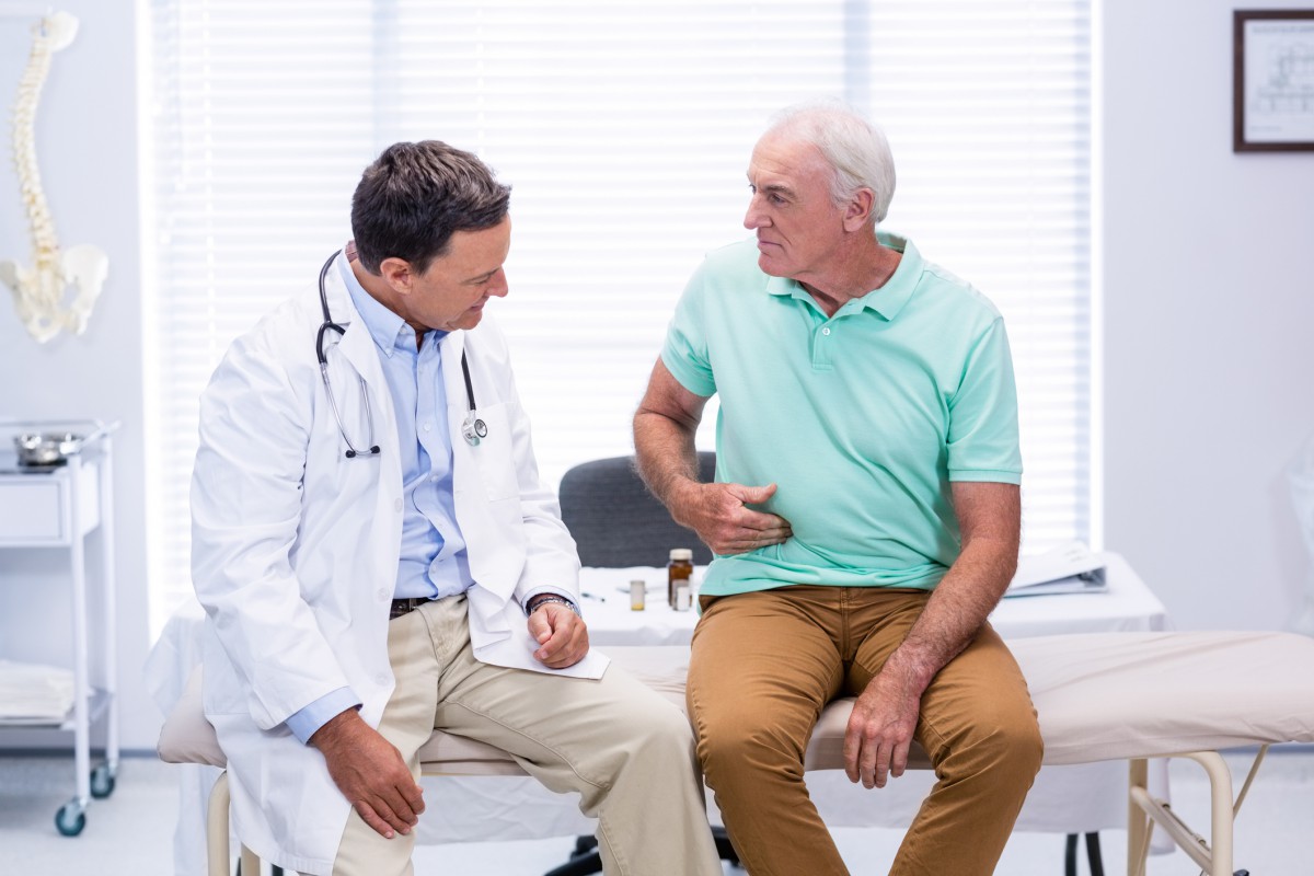 Man-doctor-Stomach_iStock-653833054
