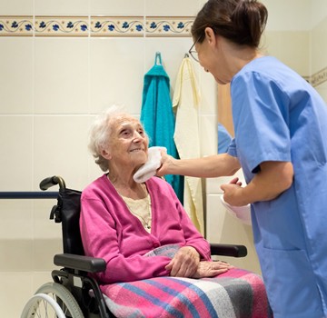 CROPPEDPersonal-Care-Aide-Wheelchair_Woman_iStock-613314366