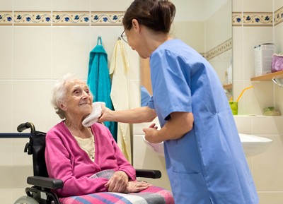 CROPPEDTWOPersonal-Care-Aide-Wheelchair_Woman_iStock-613314366