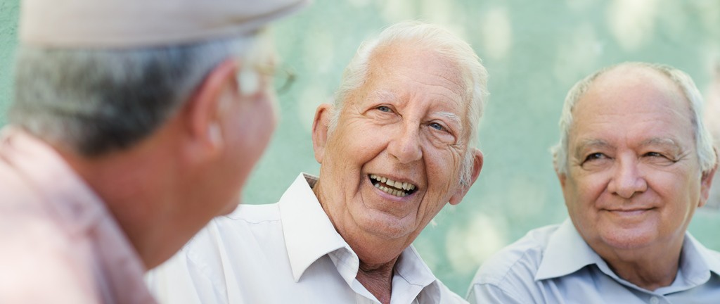 Three Caucasian elderly Men Talking