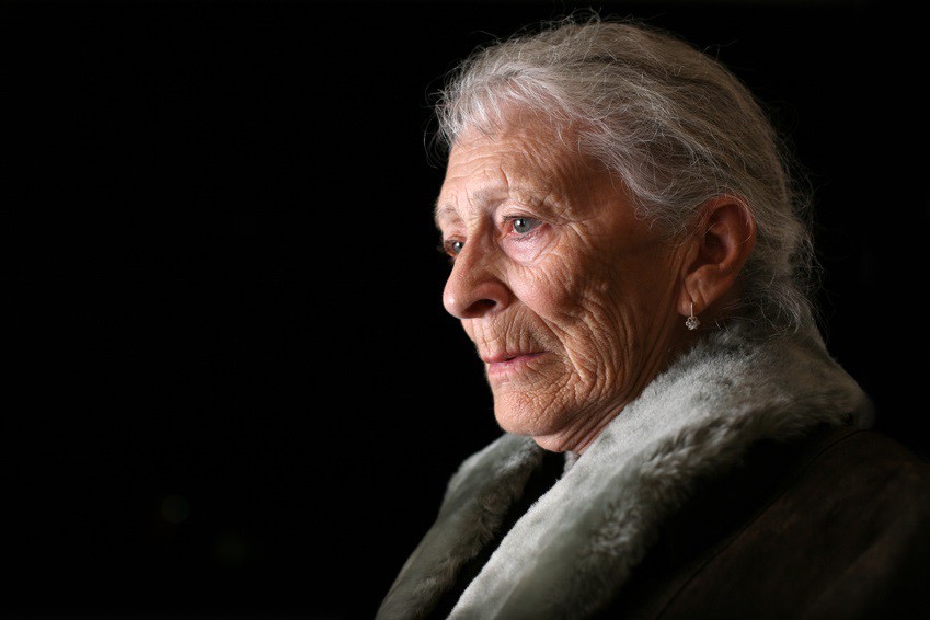 Sad elderly woman